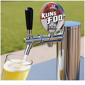 Beer tap labeled 'Kung Foo Lager' dispensing beer into a glass with a blurred green background.
