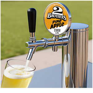 2 Brothers Pineapple Cider tap pouring into a glass with a blurred green background